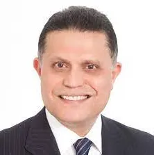 Dr Minoo Patel