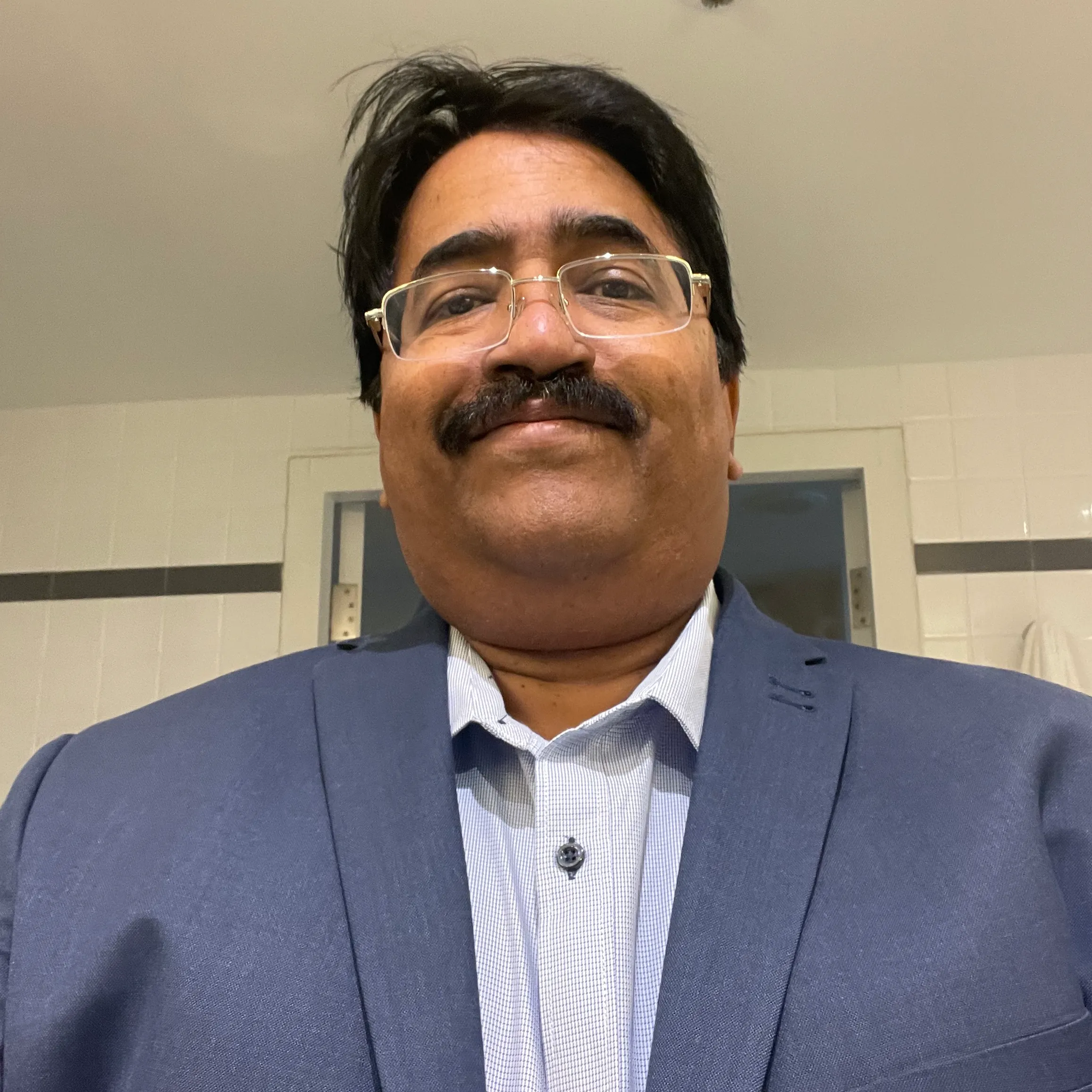 Dr Radha Nair